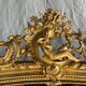 Large gilded mirror with acanthus leaf pediment H150 L98