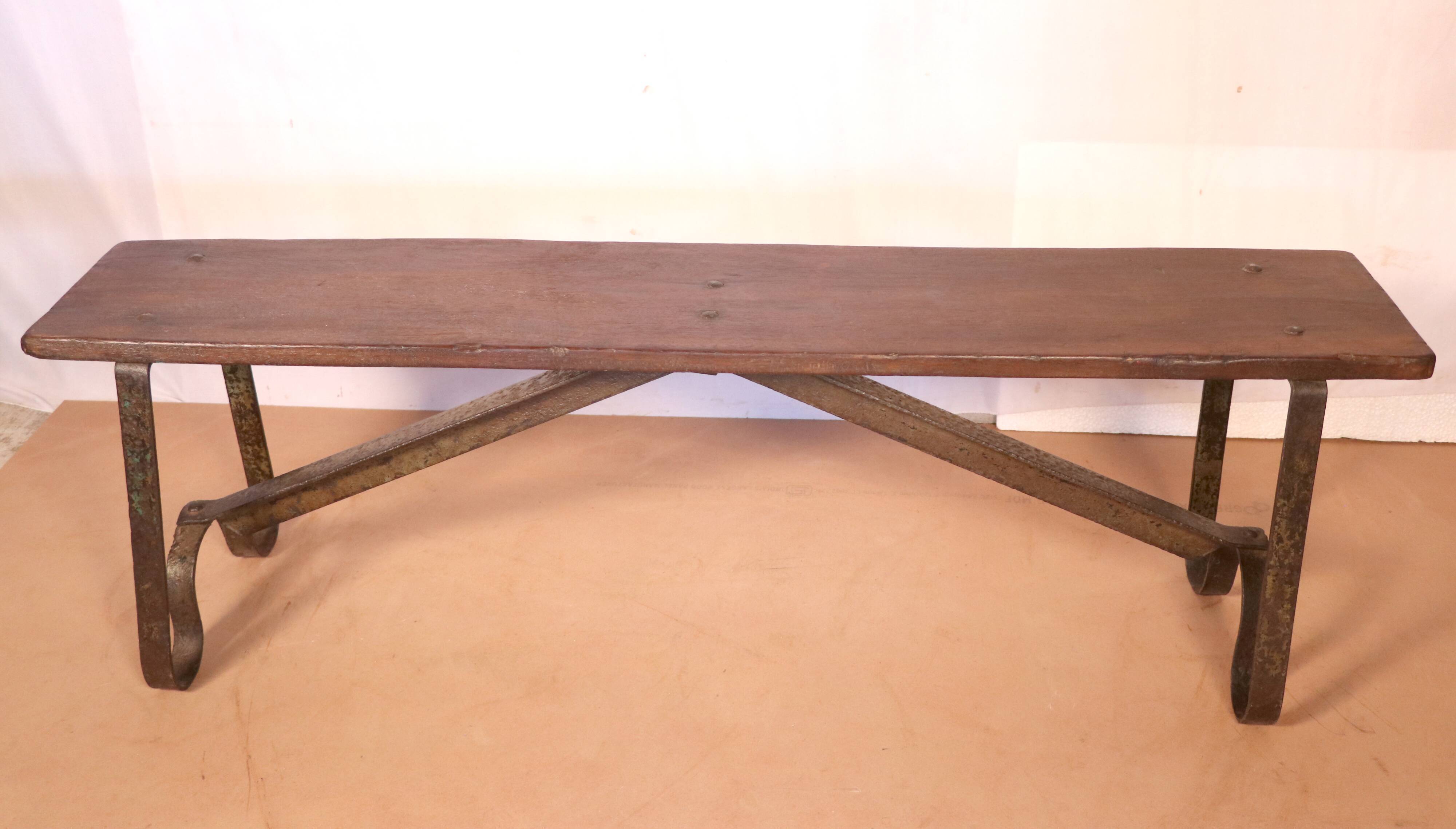 Old Burmese teak bench and wrought iron base