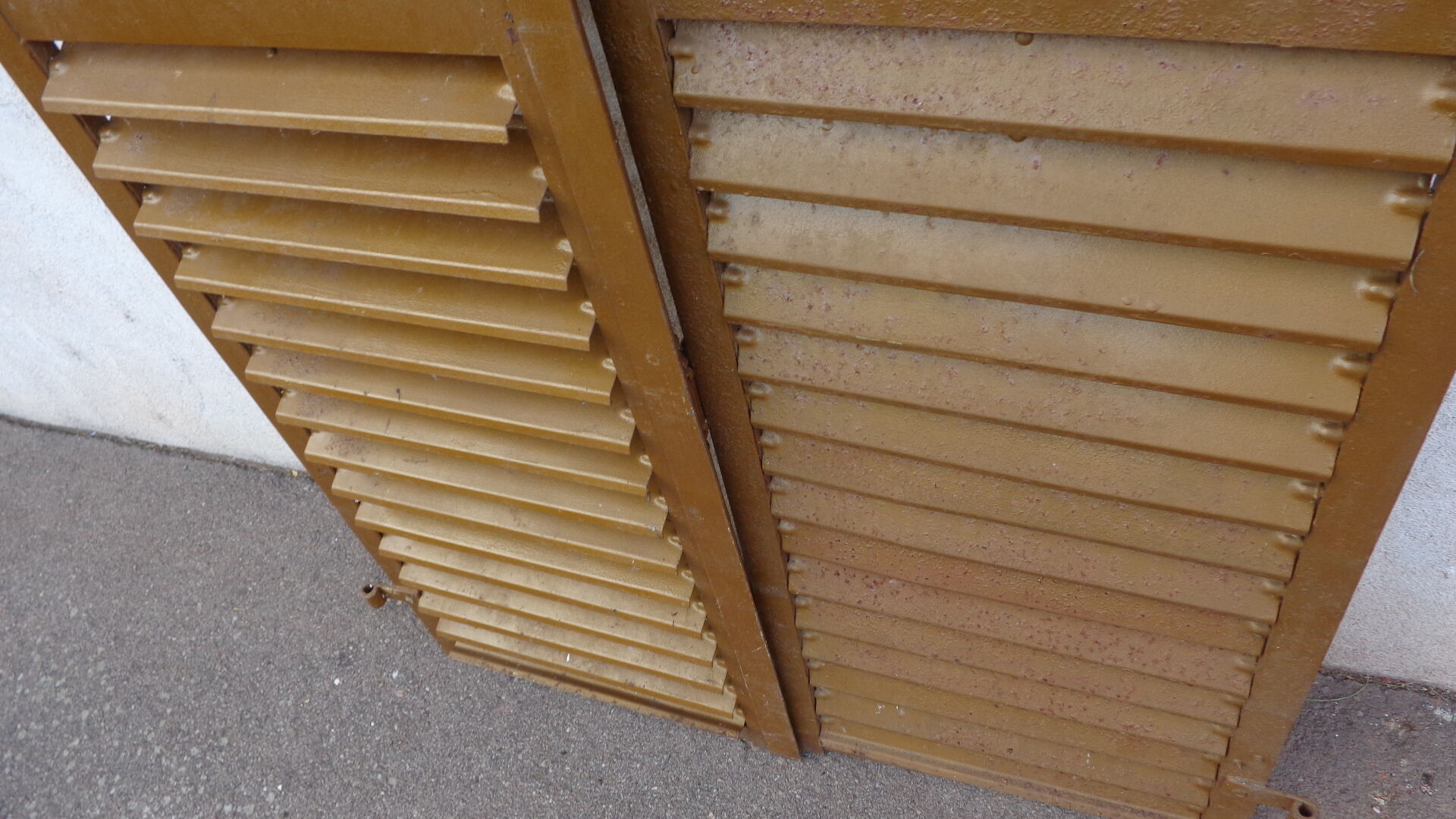 Pair of metal shutters