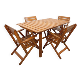 Vintage garden furniture set consisting of a table with extensions and 4 armchairs