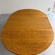 Antique round Scandinavian dining table from the 70s with 1 solid wood extension