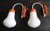 Old pair of orange design wall lights 70s vintage bulb shape