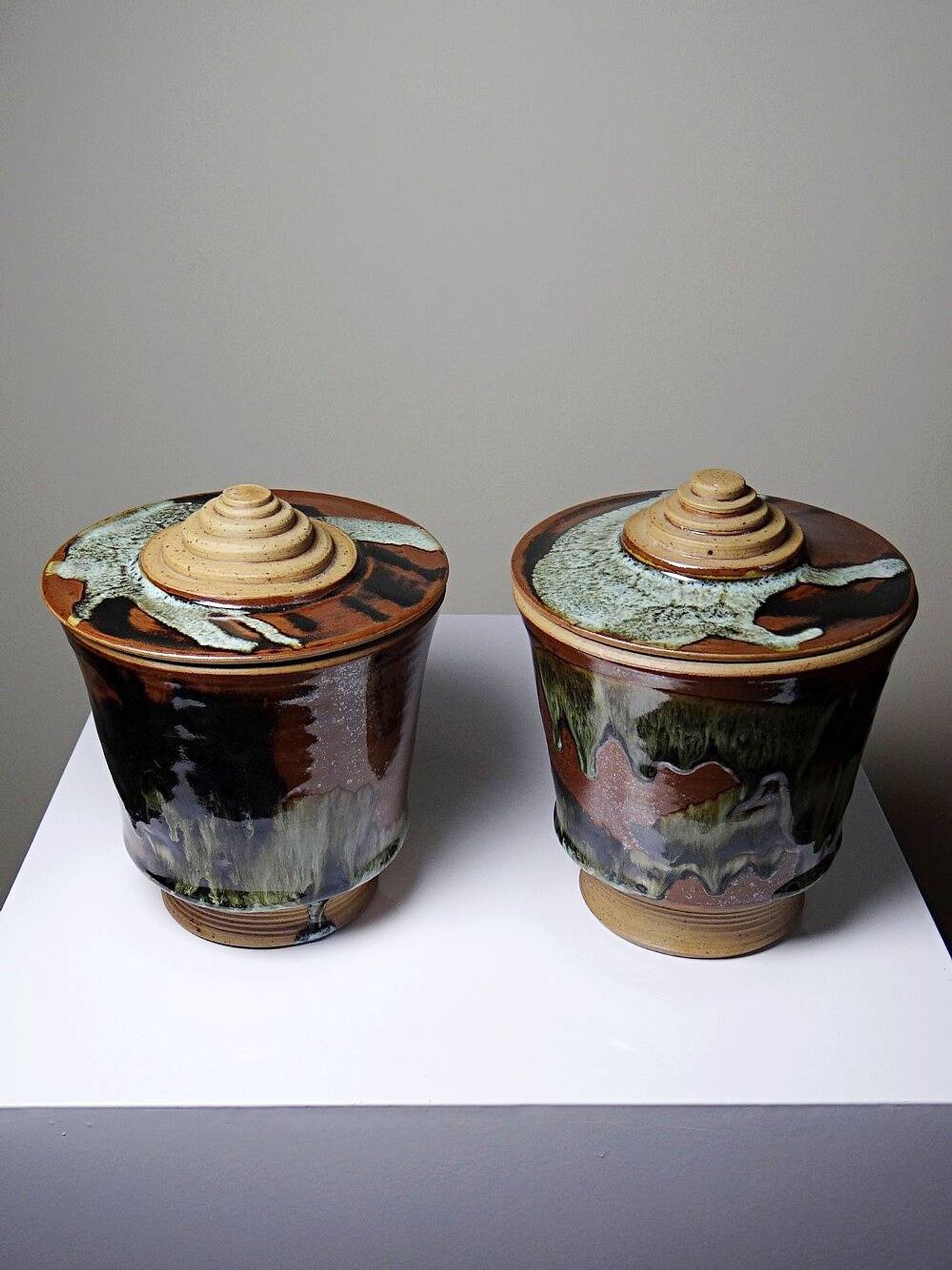 A pair of vintage stoneware pots from the 80s-90s with a Japanese style, signed handmade pottery.