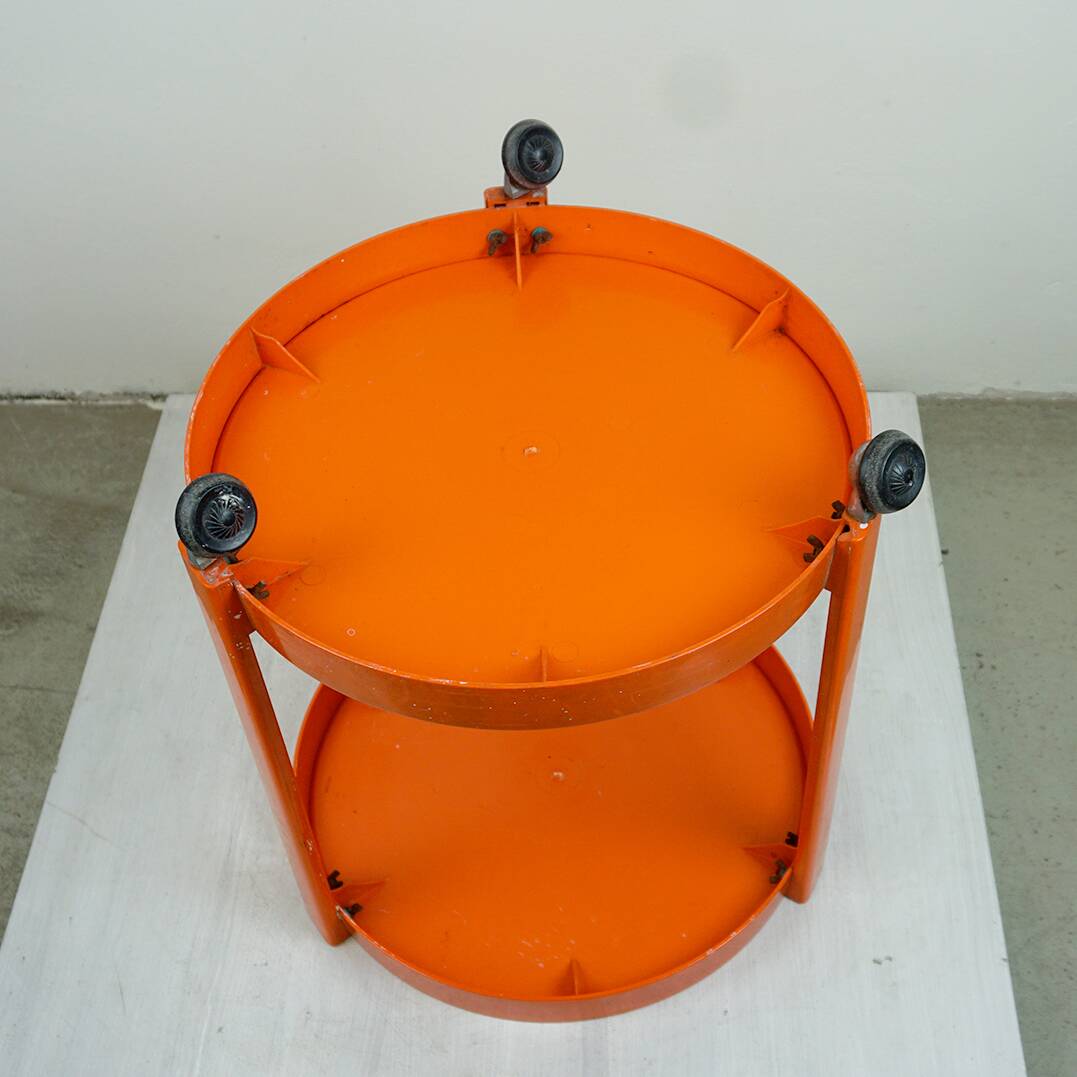 Circular orange Italian Space Age plastic trolley