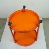 Circular orange Italian Space Age plastic trolley