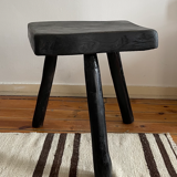 Black brutalist tripod stool