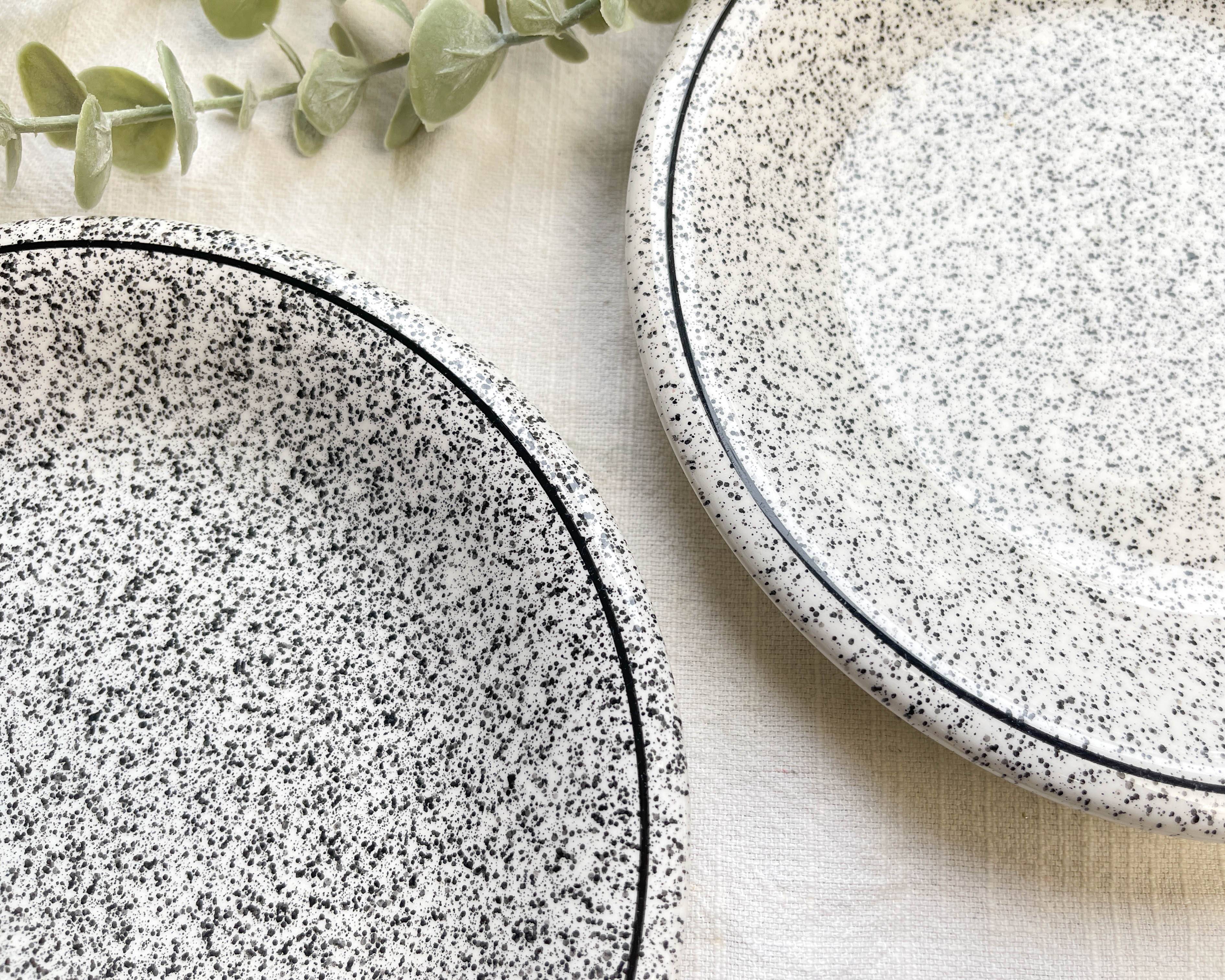 2 Small vintage plates in black and white speckled Italian earthenware