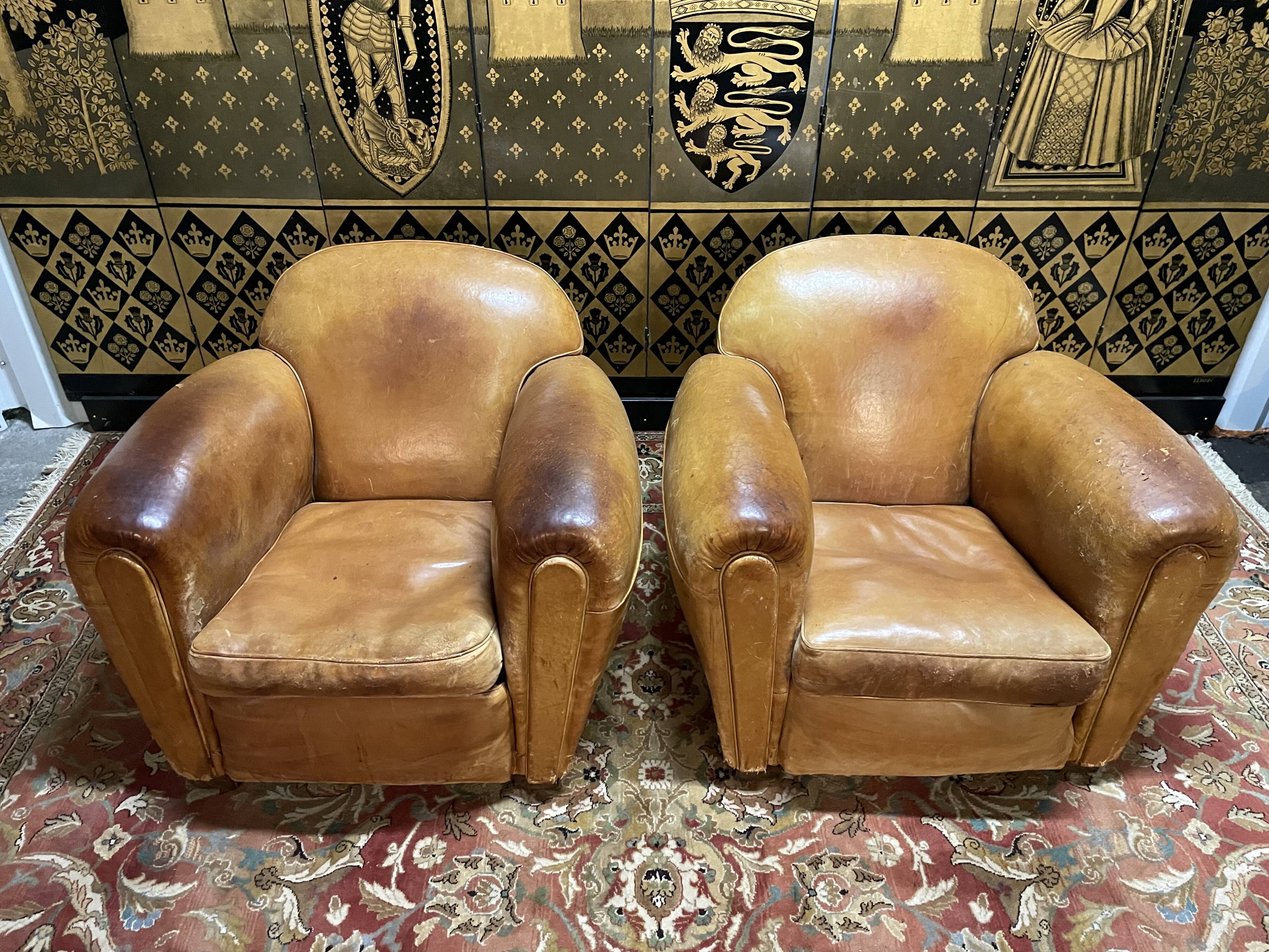 Pair of club armchairs in Havana leather 1950