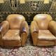 Pair of club armchairs in Havana leather 1950