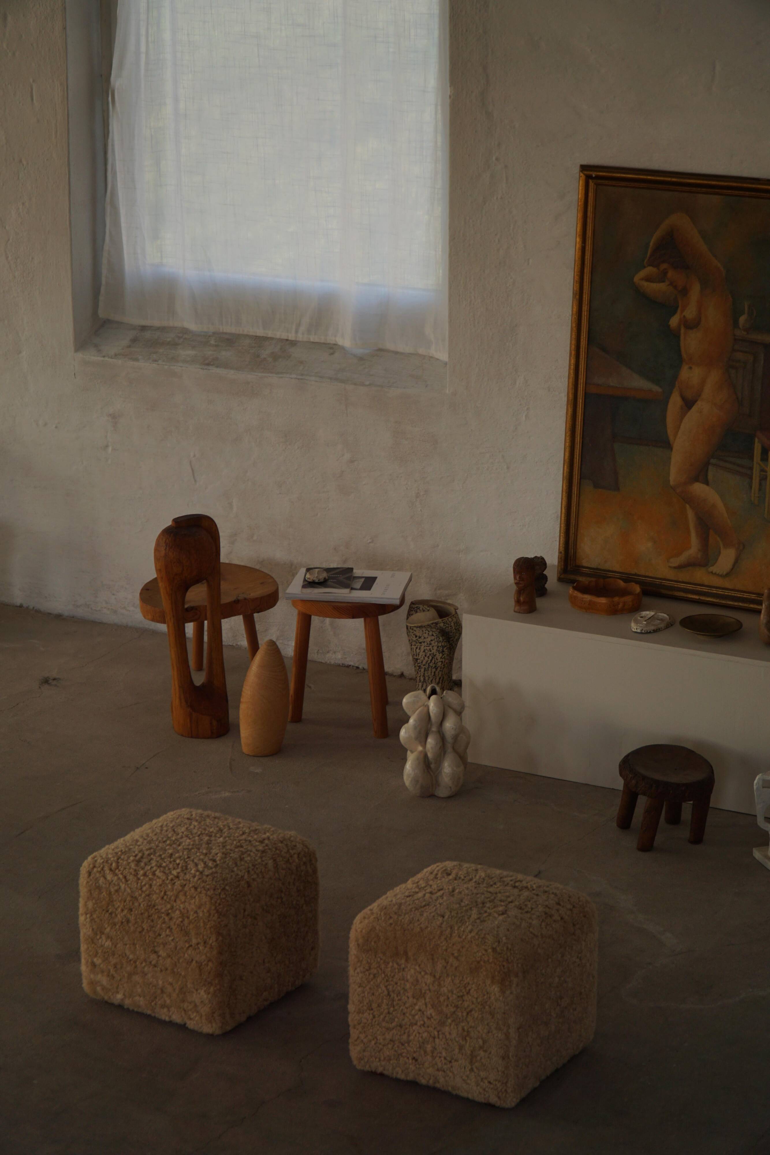 French mid-century cube poufs, a pair of lambswool stools, 1960s.