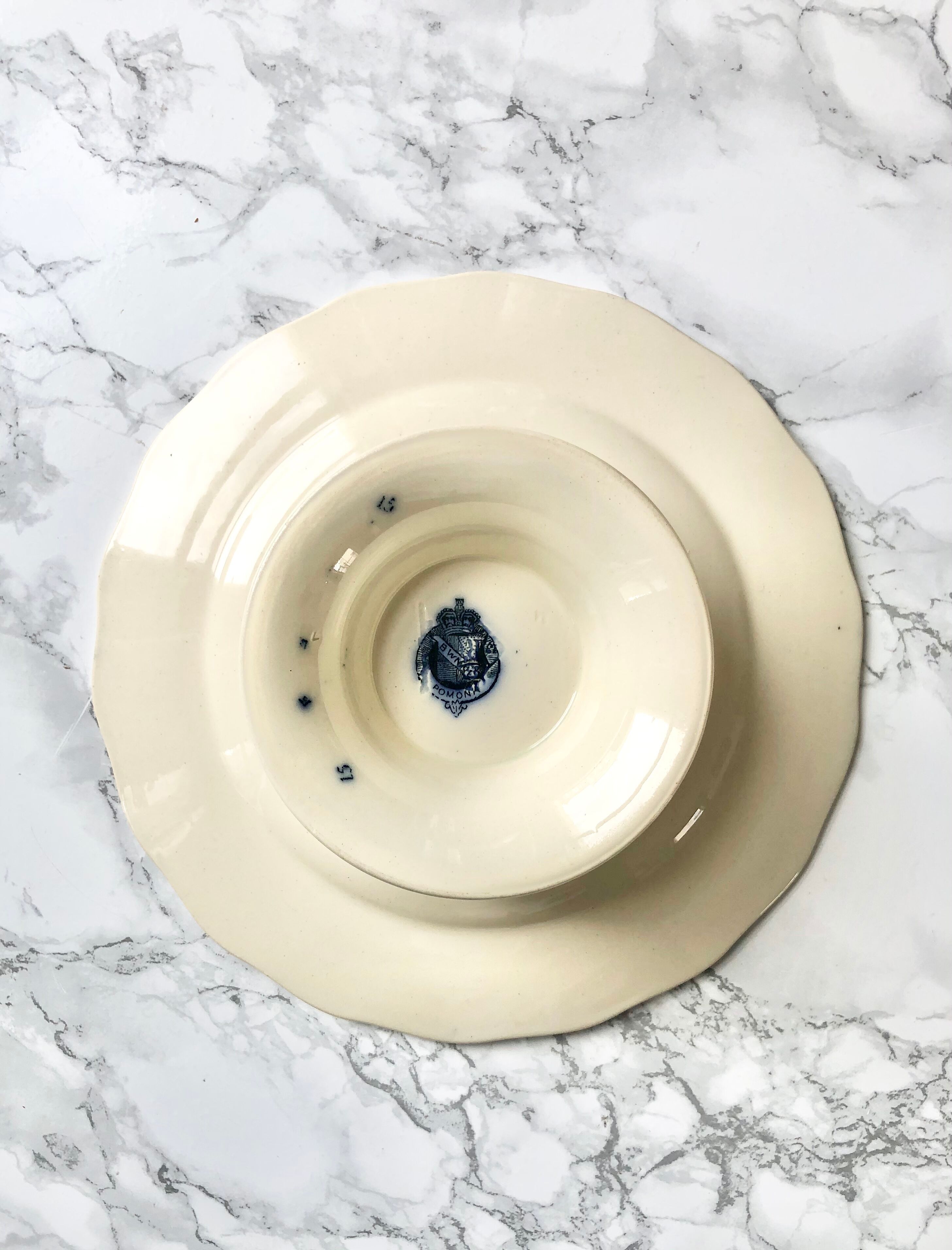 Former round cake dish on foot with blue printed decoration BWM and Co. Brown Westhead Moore - Co