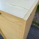 Beige wooden cabinet with curtains or sliding shutters 120cm