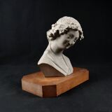 Terracotta bust of the smiling angel from Reims Cathedral with base