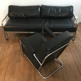 Sofa and armchair in chrome metal and black leather
