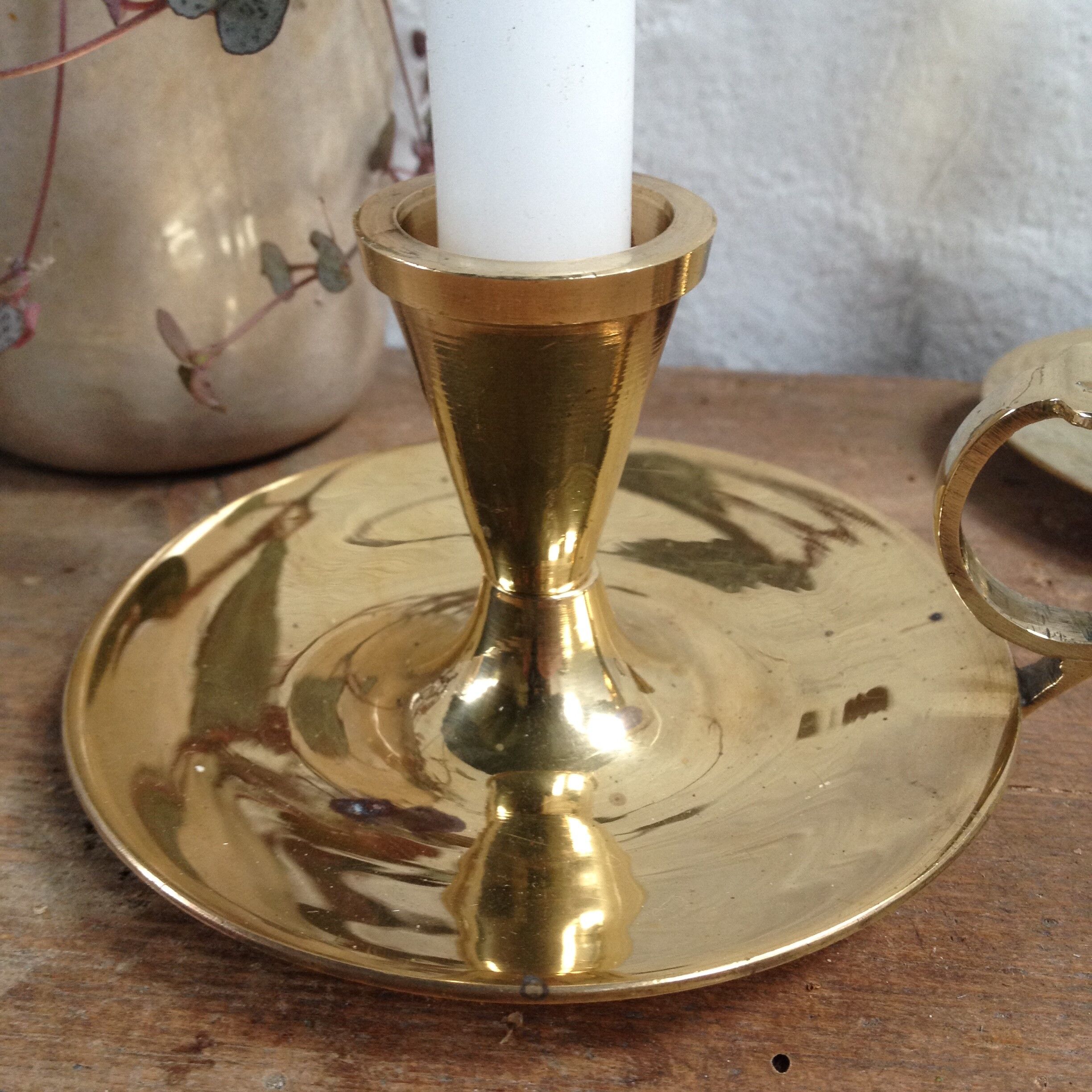 Pair of brass cellar rat candlesticks
