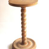 Beaded wood pedestal table