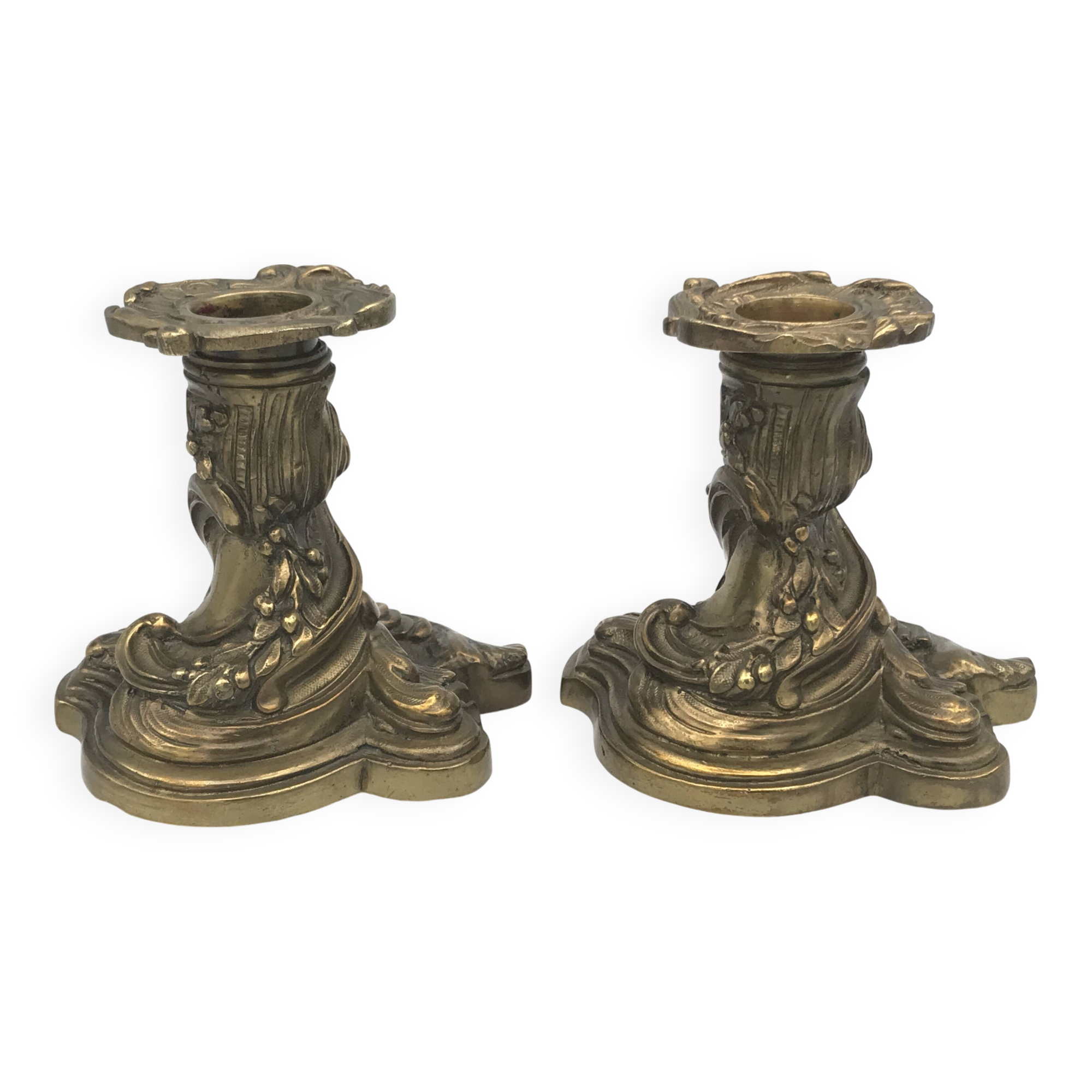 Pair of gilded bronze candlesticks with twisted decor and floral garlands, louis xv style