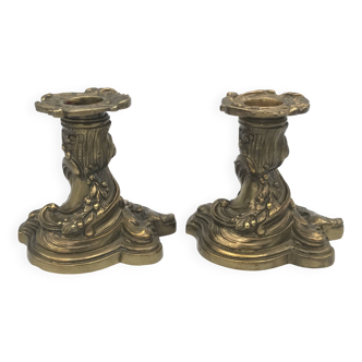 Pair of gilded bronze candlesticks with twisted decor and floral garlands, louis xv style