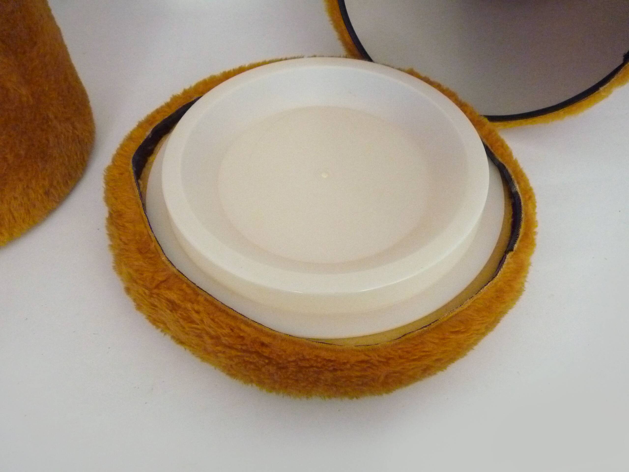 Pair of poufs, fur stools with storage inside, 1970s.