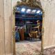 Napoleon III mirror in wood and gilded stucco with gold leaf.