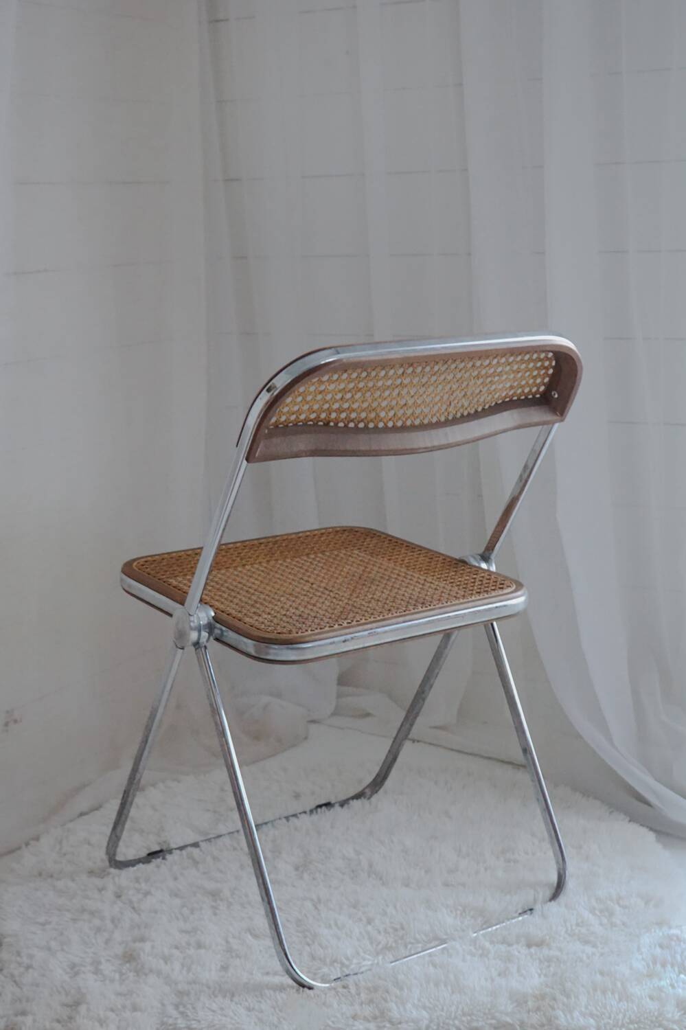 Vintage design cane folding chair: Giancarlo Piretti