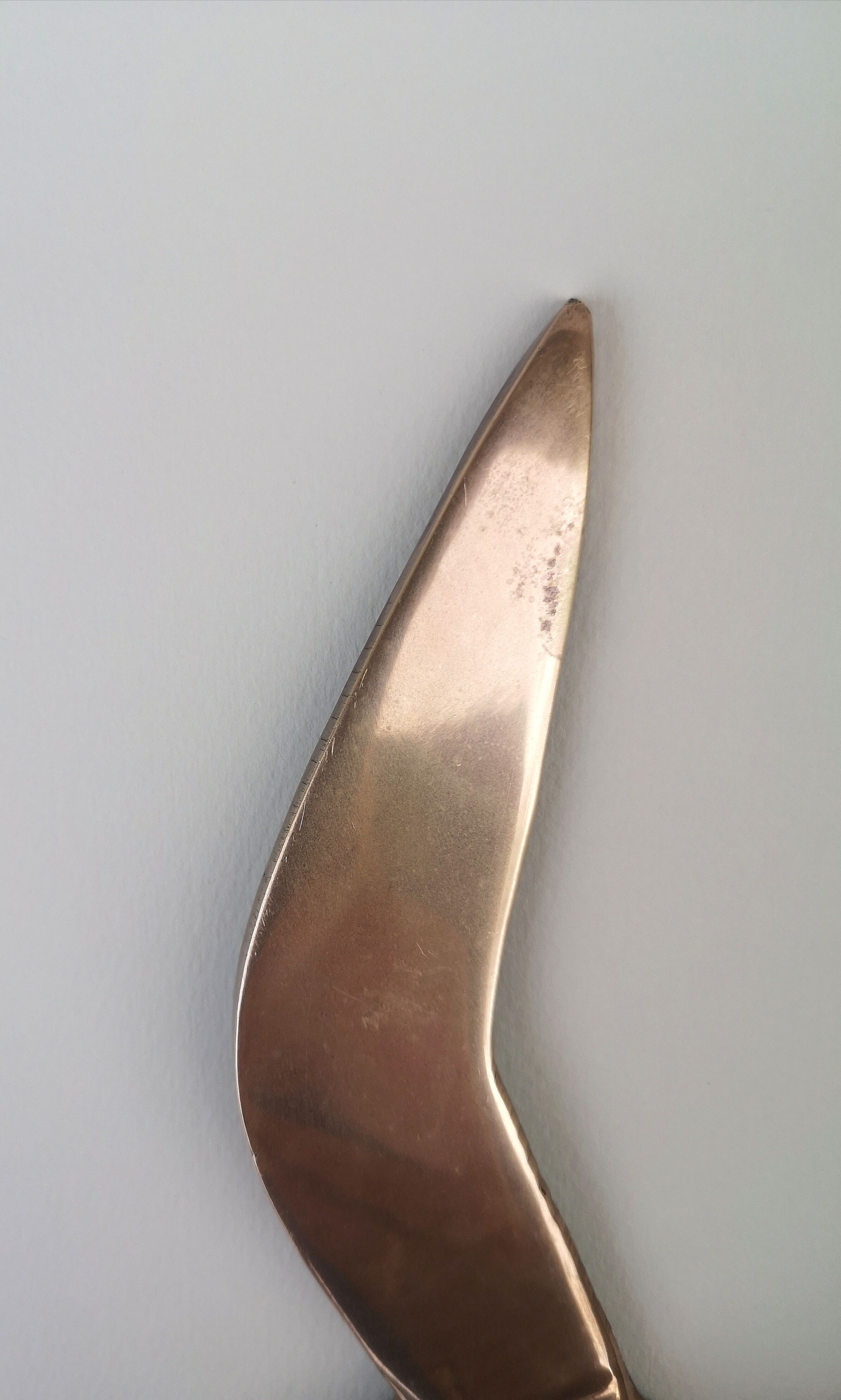 Stylized brass birds