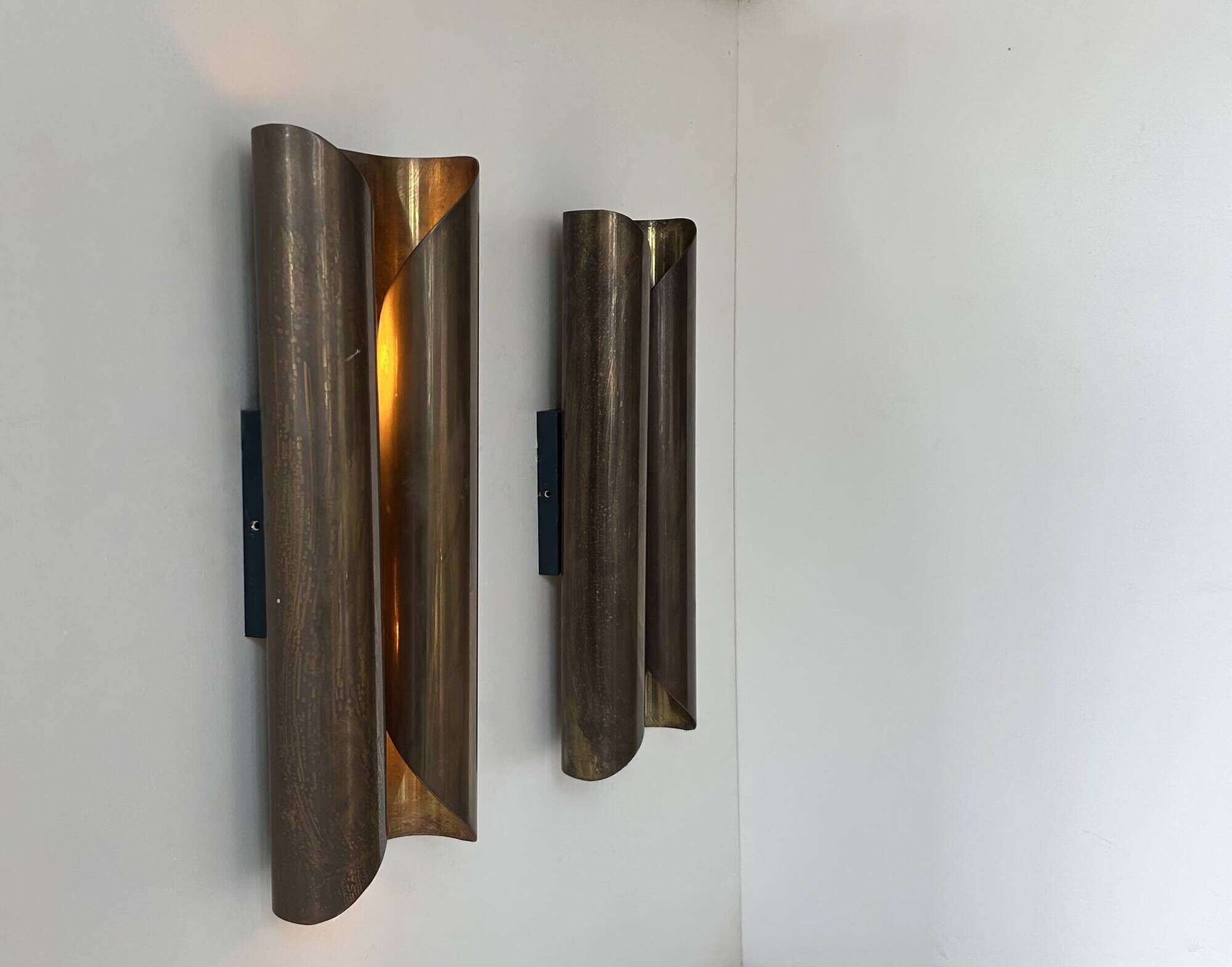Pair of vintage wall lights in patinated brass, France 1970