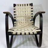 Vintage black lounge chair by Jan Vaněk