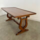 Old rectangular wood coffee table with lyre side posts