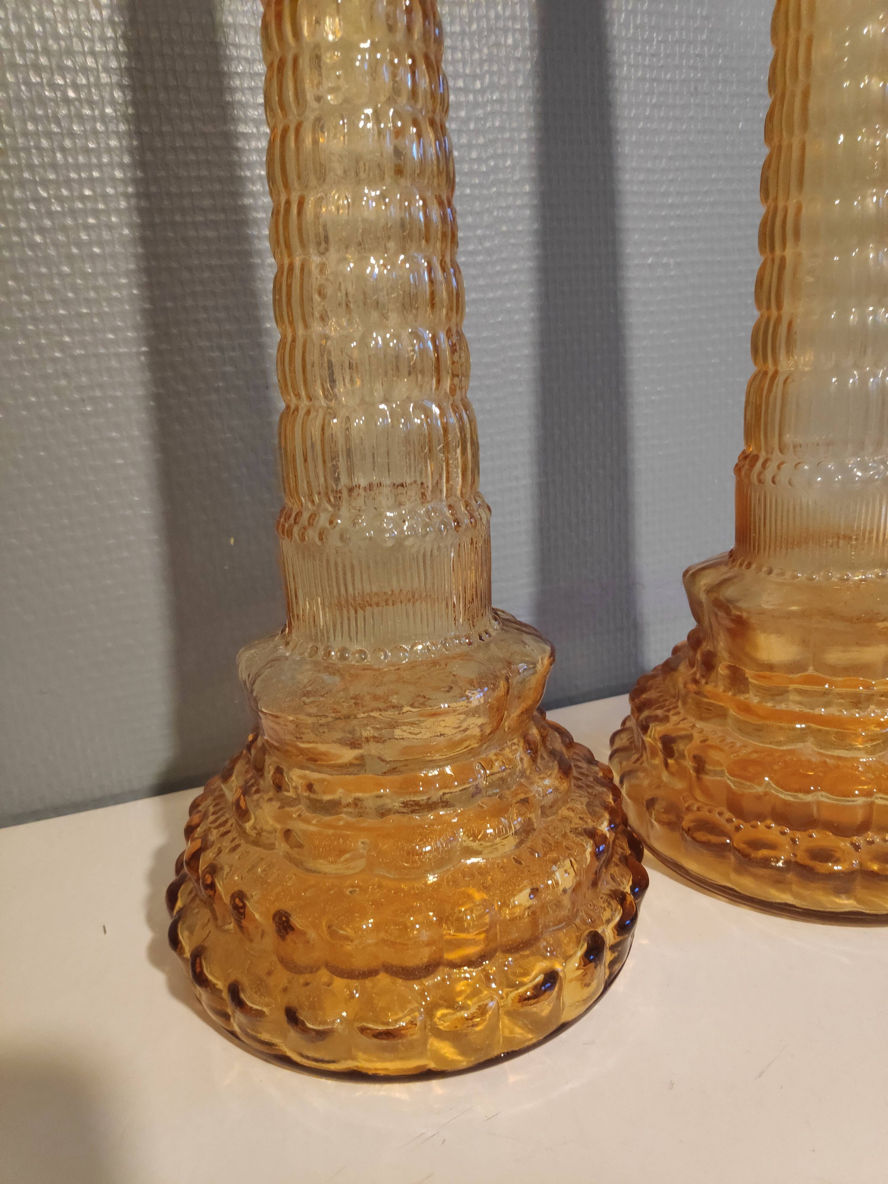 Pair of amber-coloured carafes