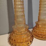 Pair of amber-coloured carafes
