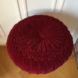 Coussin rond rouge bordeaux en velours plié