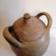 Old jar, glazed sandstone jug. Early twentieth century.