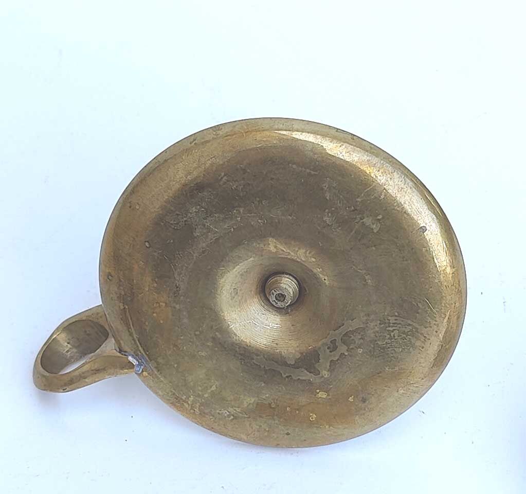 Golden brass candle holder