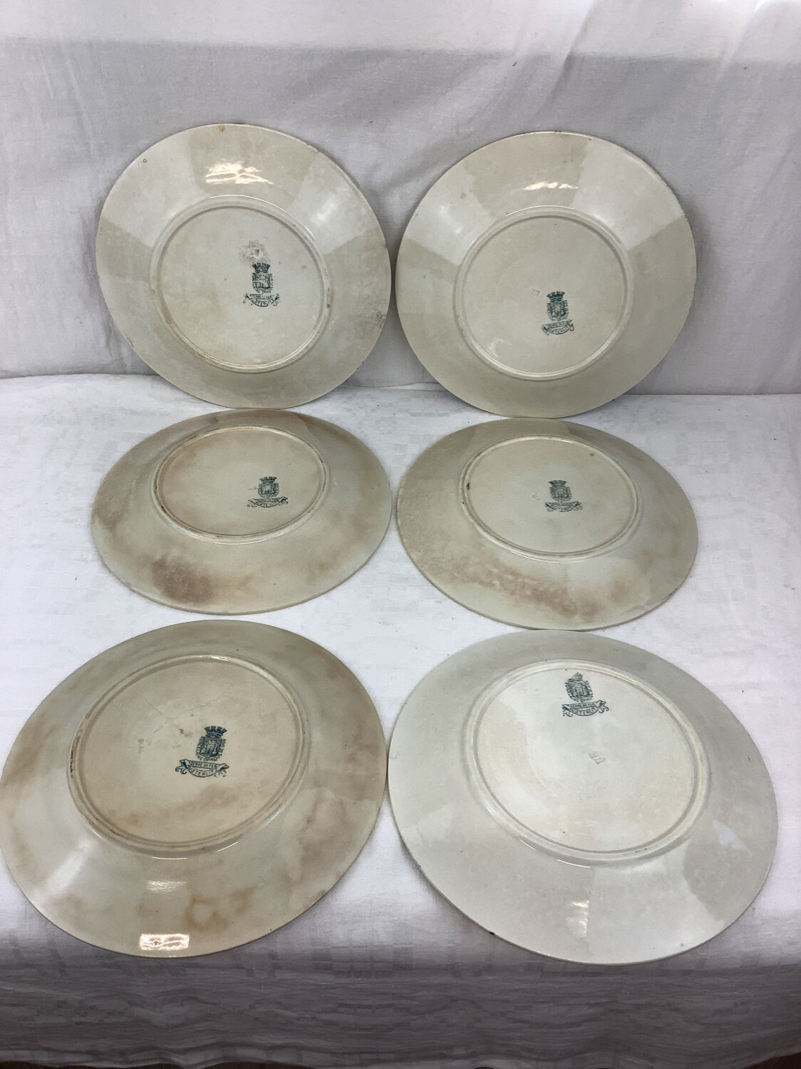6 old flat iron earth plates