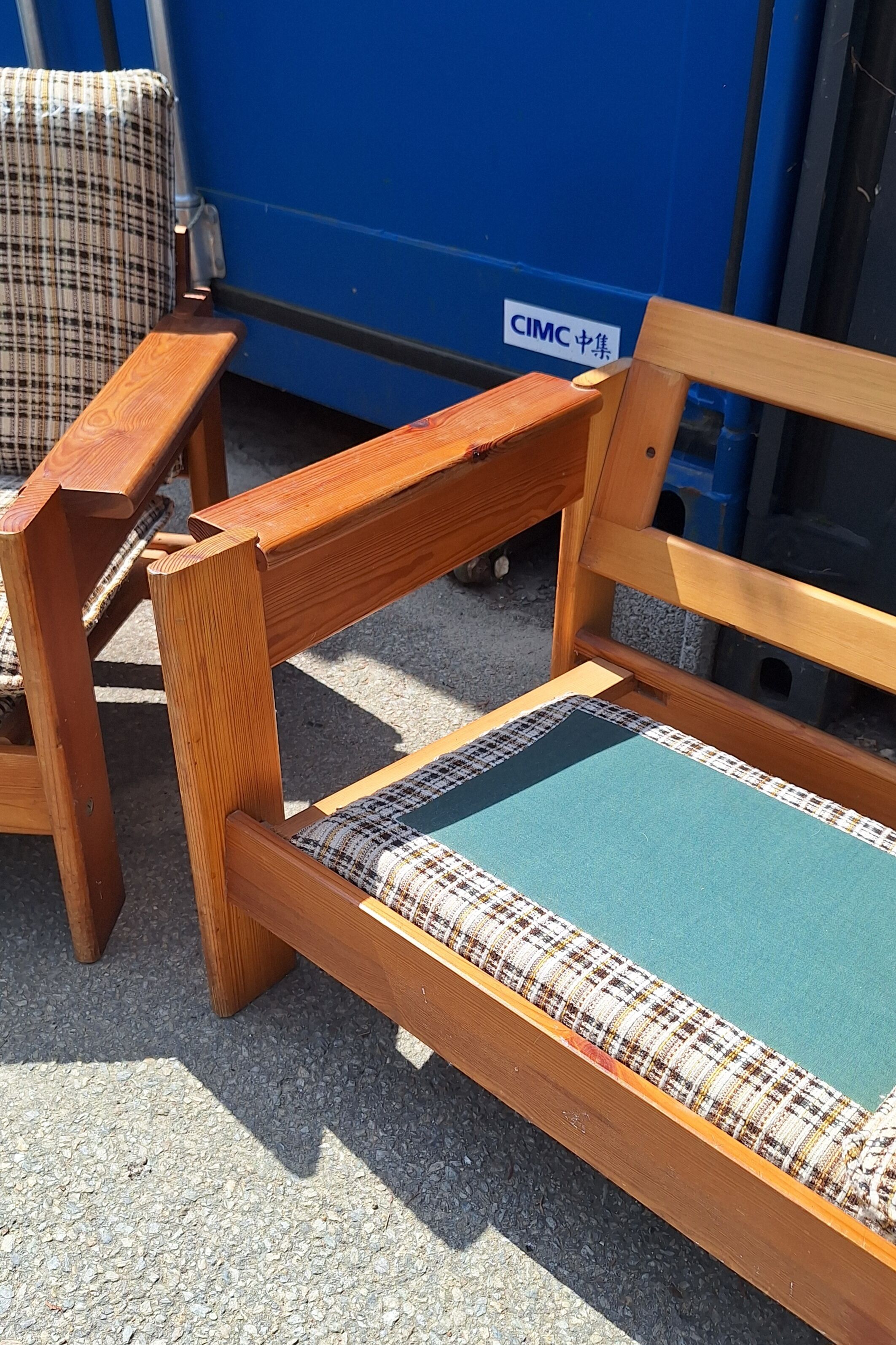 Brutalist-style bench and armchairs in 1970s pine.