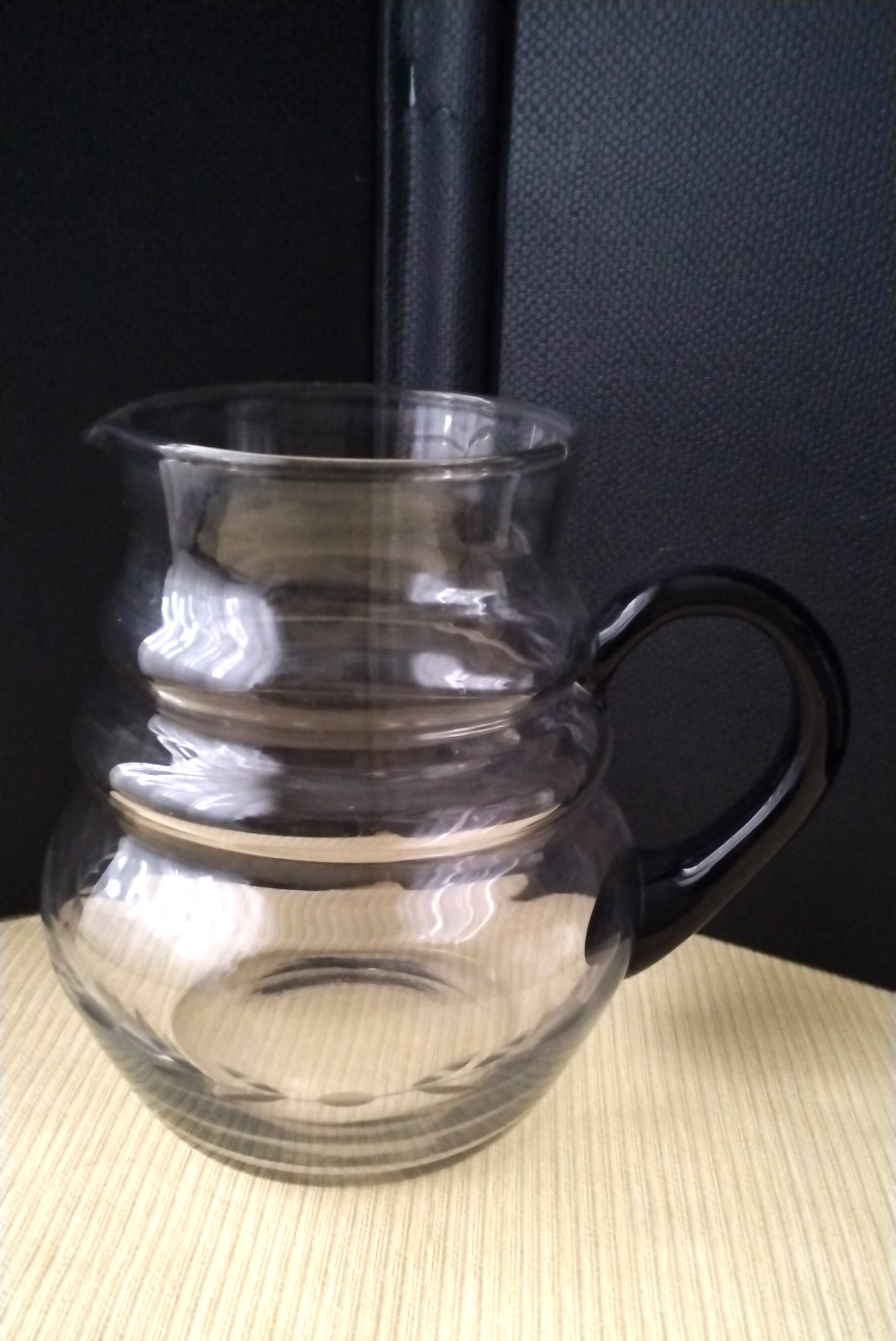 Water jug, blown glass carafe. Delicate engraved decoration