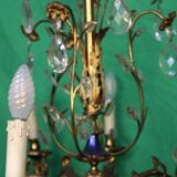 19th-century French gilt bronze chandelier featuring brass flowers and