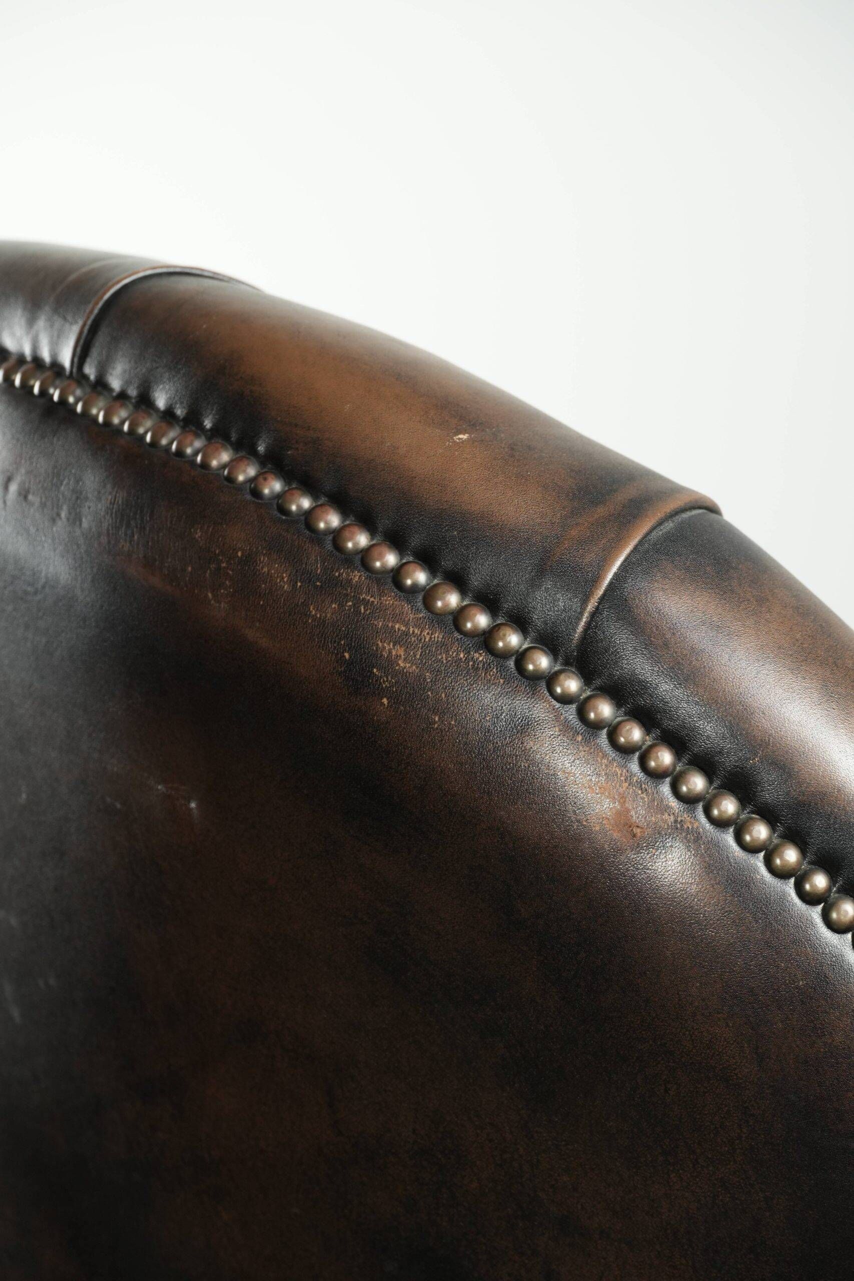 Vintage Chesterfield office chair with decorative nails in English style