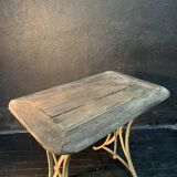 Ancient wrought iron and wood garden table