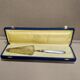 Shovel has silver metal pie art deco