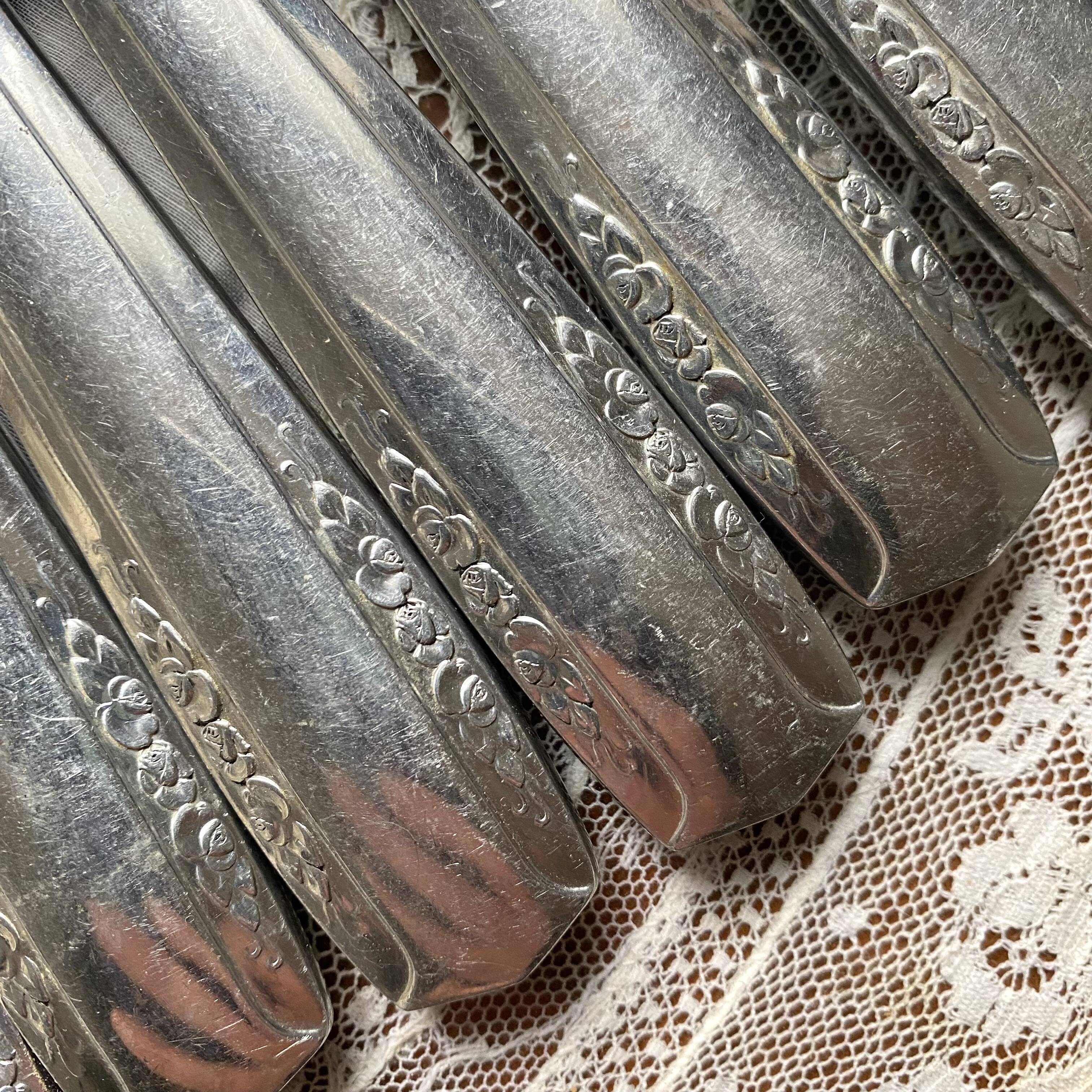 Silver-plated knives with stainless steel blades, Vego brand, 1950s