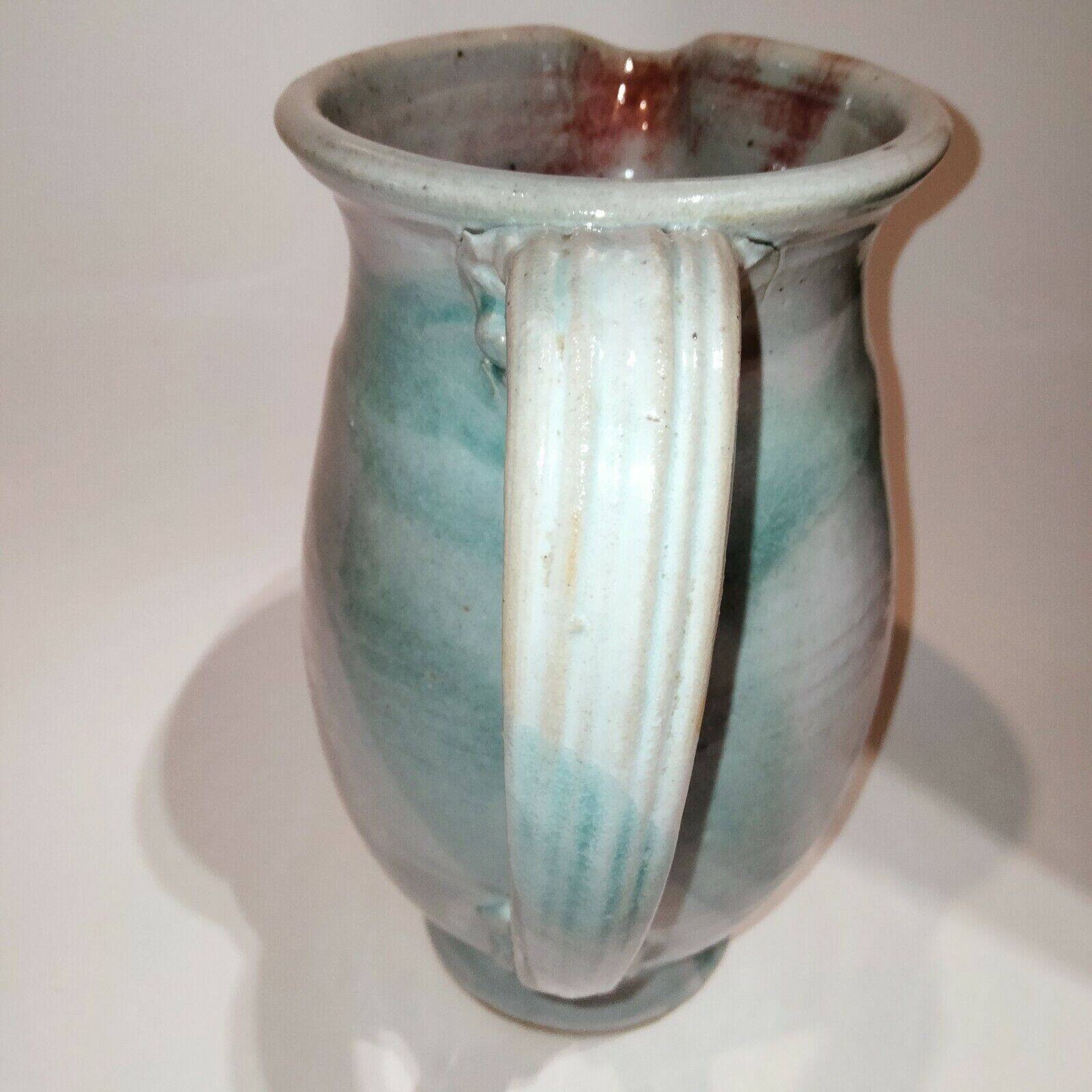 Red and grey glazed stoneware pitcher Signed Height 21 cm