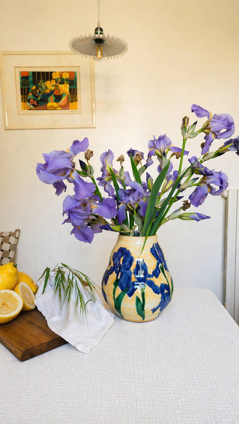 Hand-painted decorative vase with blue/purple irises.