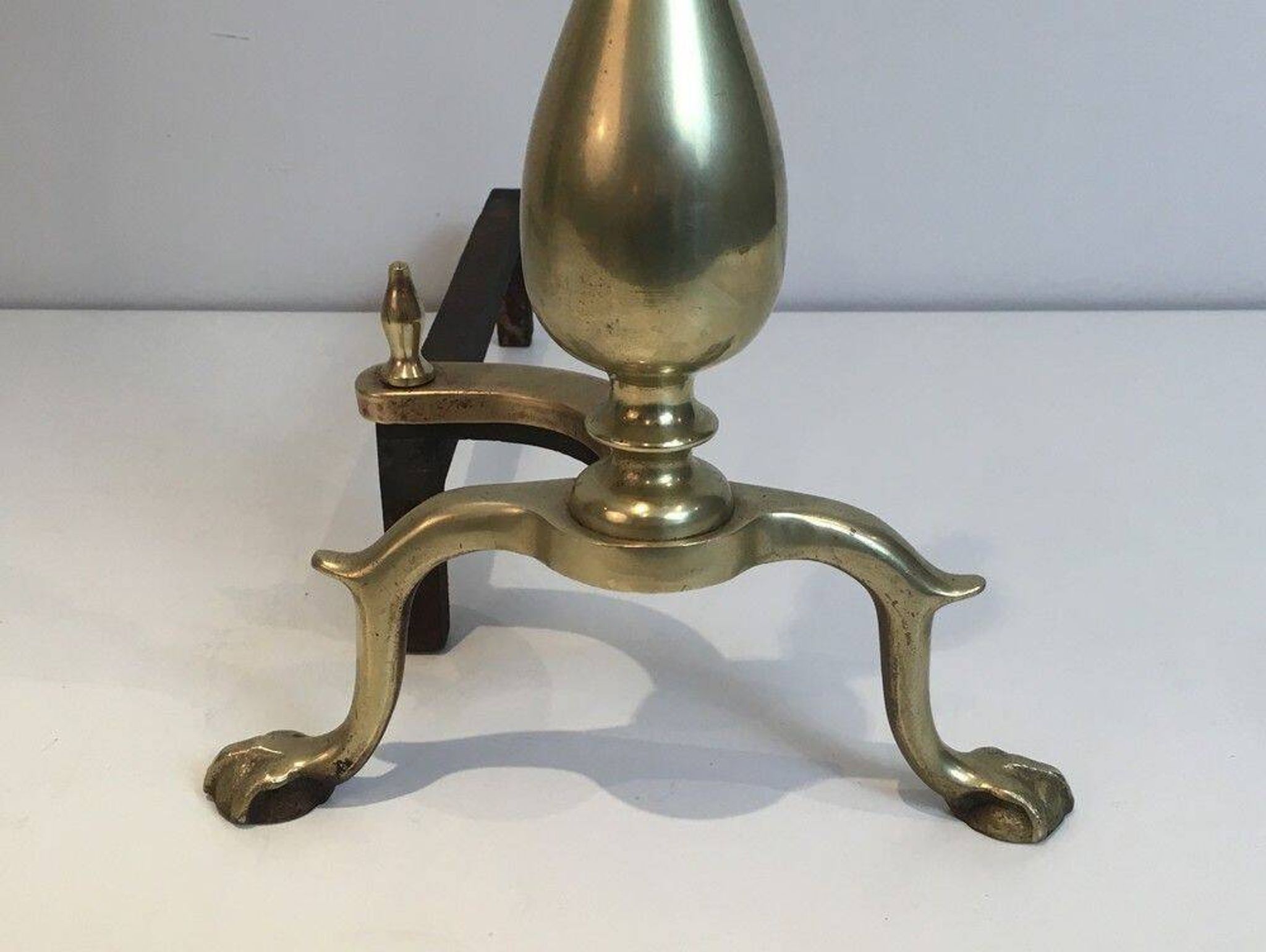 Pair of neo-Gothic bronze and wrought iron andirons