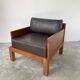 Modernist armchair in exotic wood and leather
