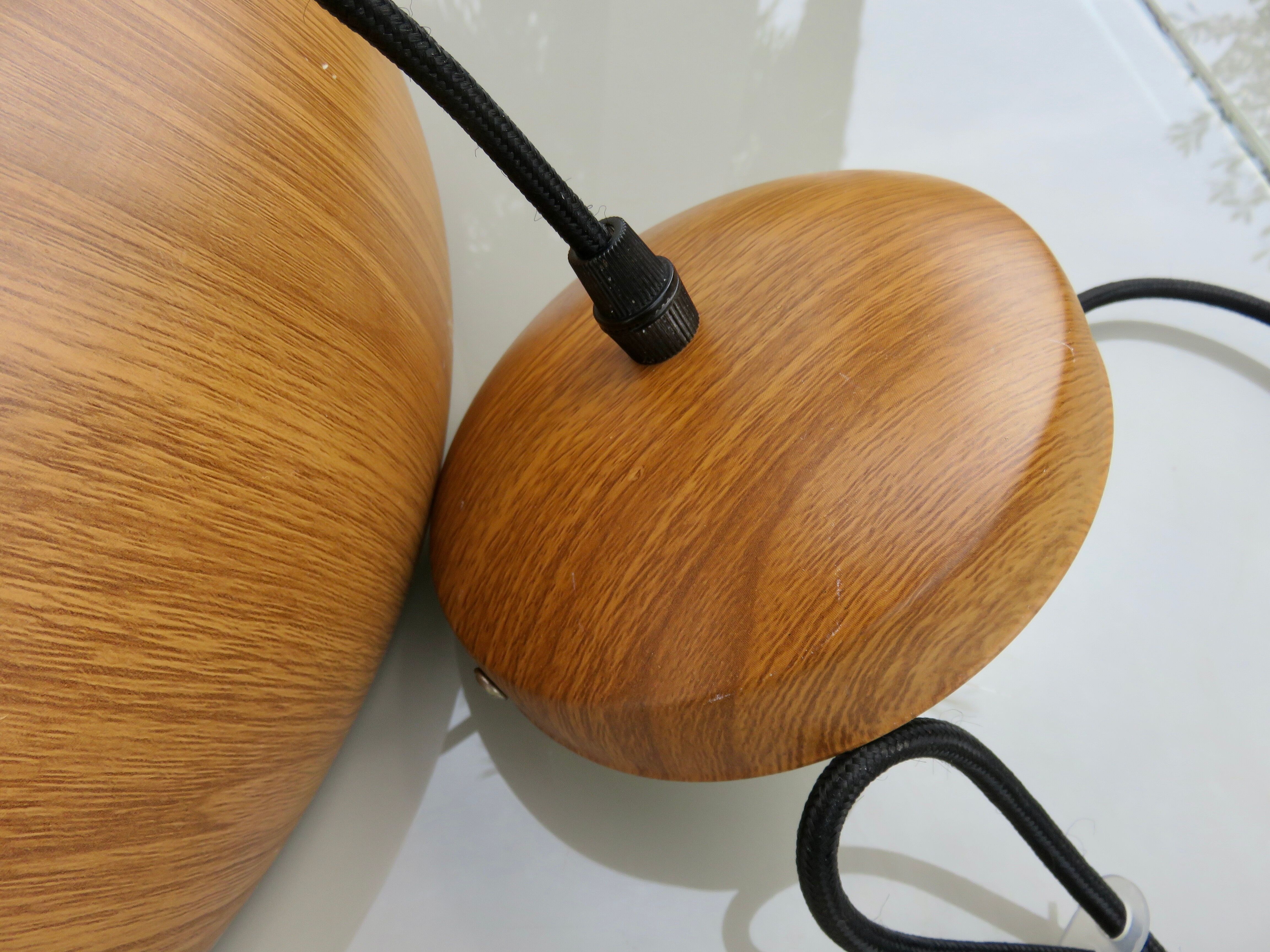 Scandinavian metal pendant light with a faux wood finish, 1980s.