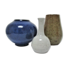 Trio of sandstone vases enamelled brown and white blue