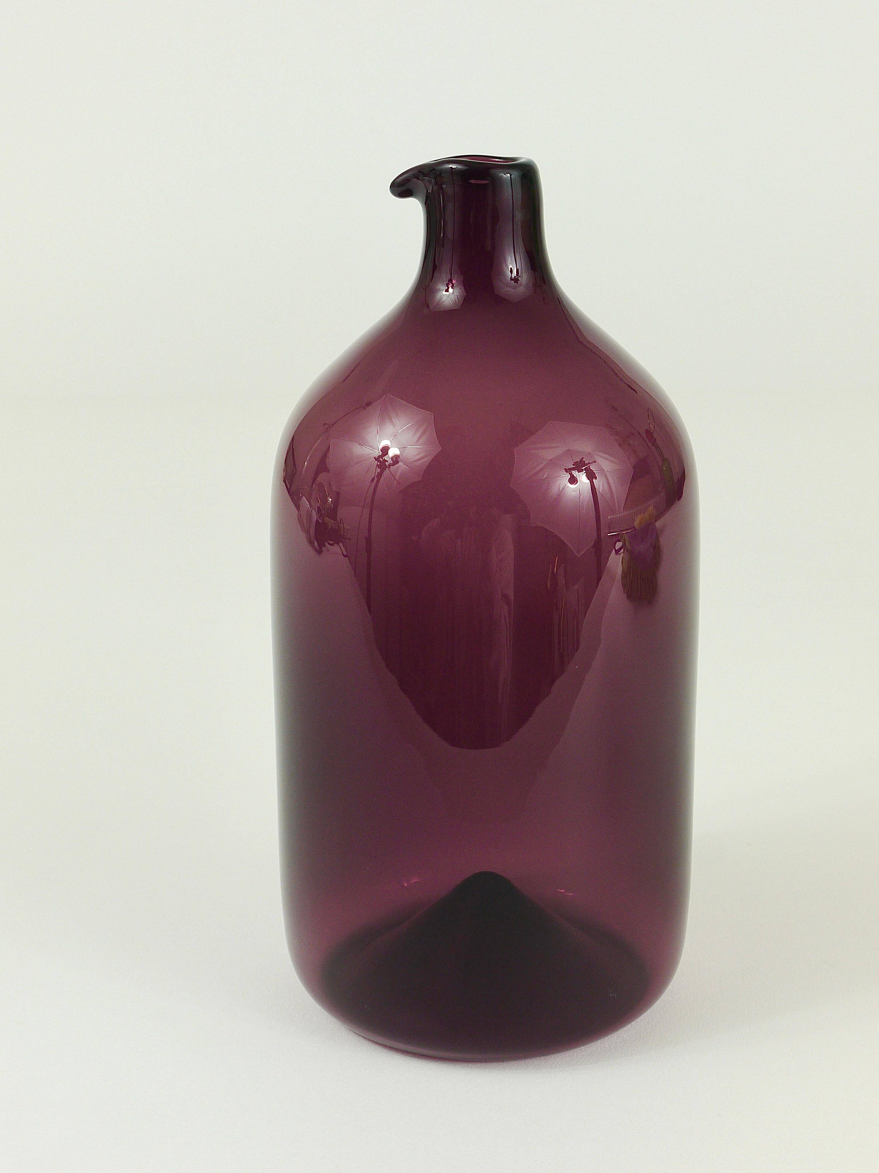 Glass vase signed Purple Timo Sarpaneva Pullo Bird Bottle, Iittala, Finland.