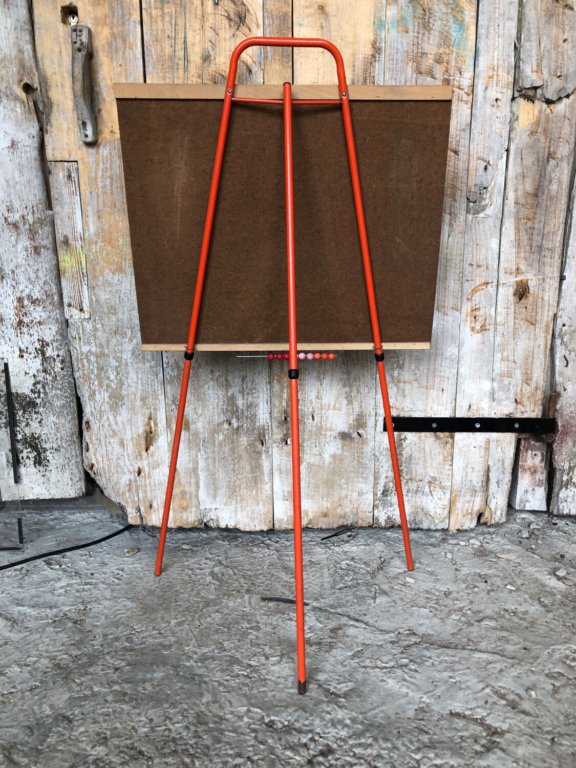 Old school board collapsible orange tube